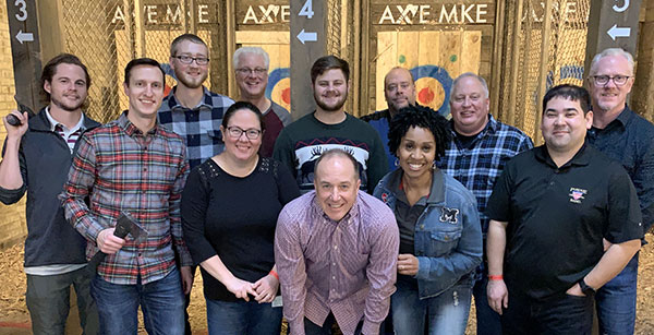 Employees at Axe Throwing Event