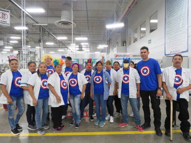 Group of people with Captain America shirts Group of people with Captain America shirts
